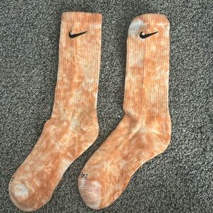 tie-dye orange and white nike socks. size 7
